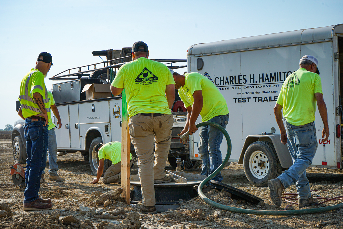 Group of men working on construction site