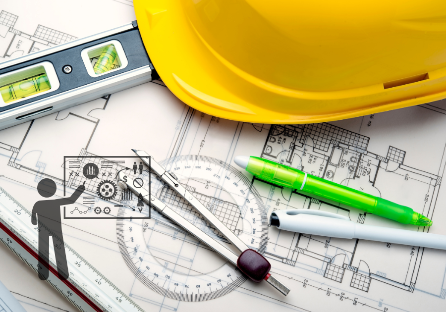 A hardhat, level, compass, and pens lay on a blueprint